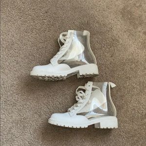 White boots that are clear on the sides